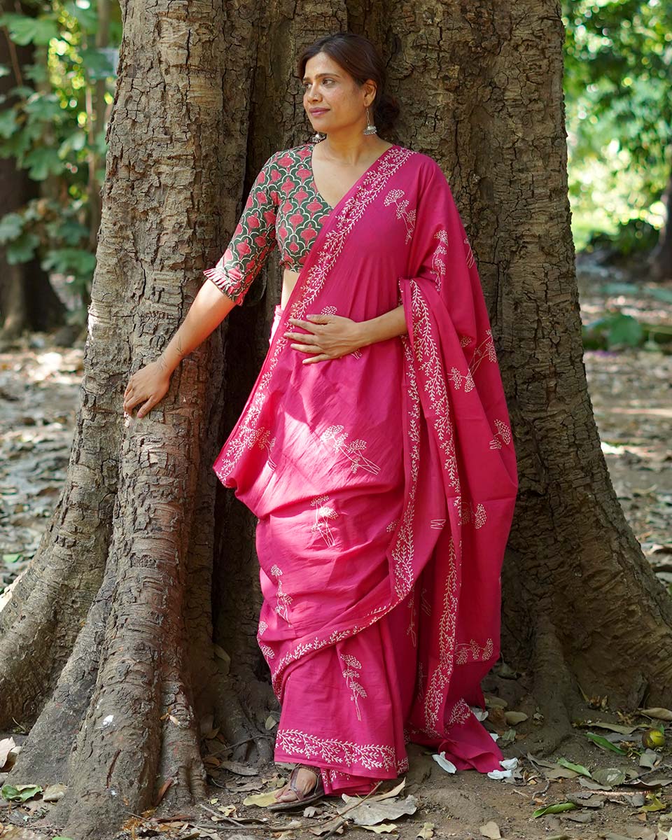 Lying on grass Pink Hand Block Printed Cotton Saree - UMT