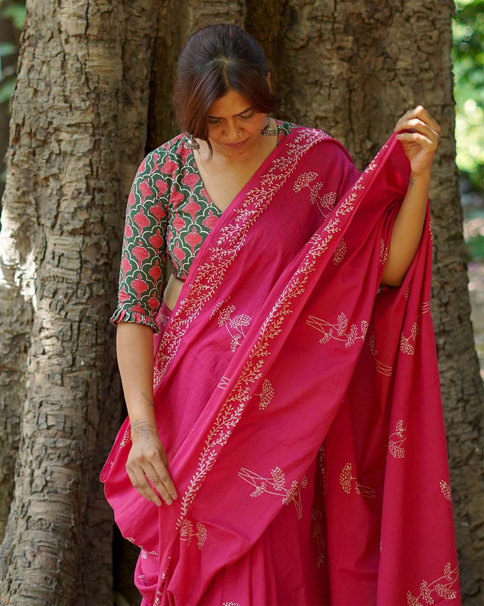 Lying on grass Pink Hand Block Printed Cotton Saree - UMT