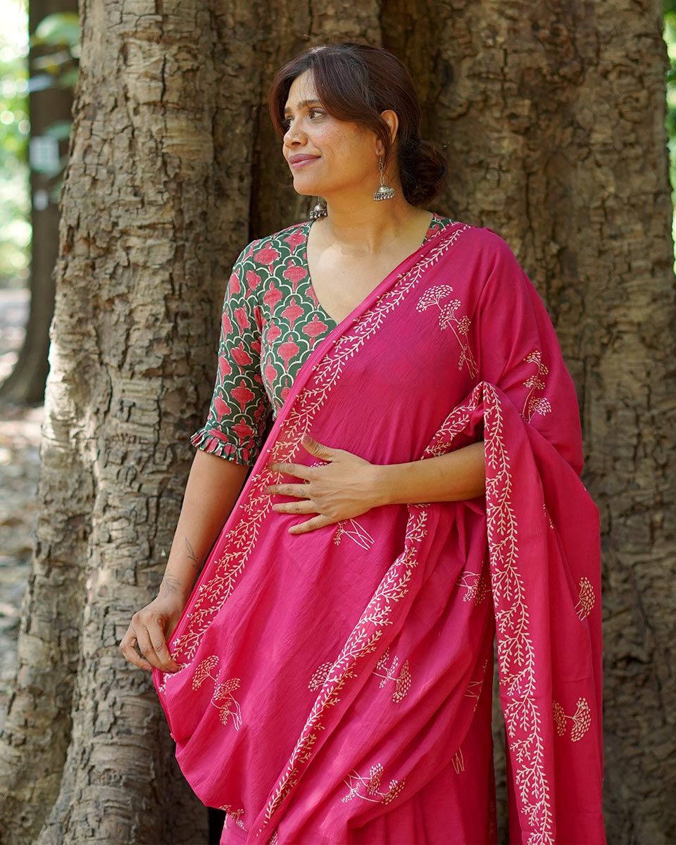 Lying on grass Pink Hand Block Printed Cotton Saree - UMT