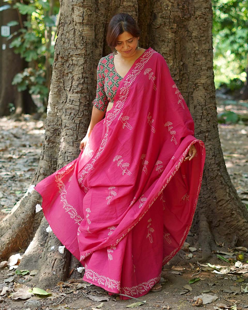 Lying on grass Pink Hand Block Printed Cotton Saree - UMT