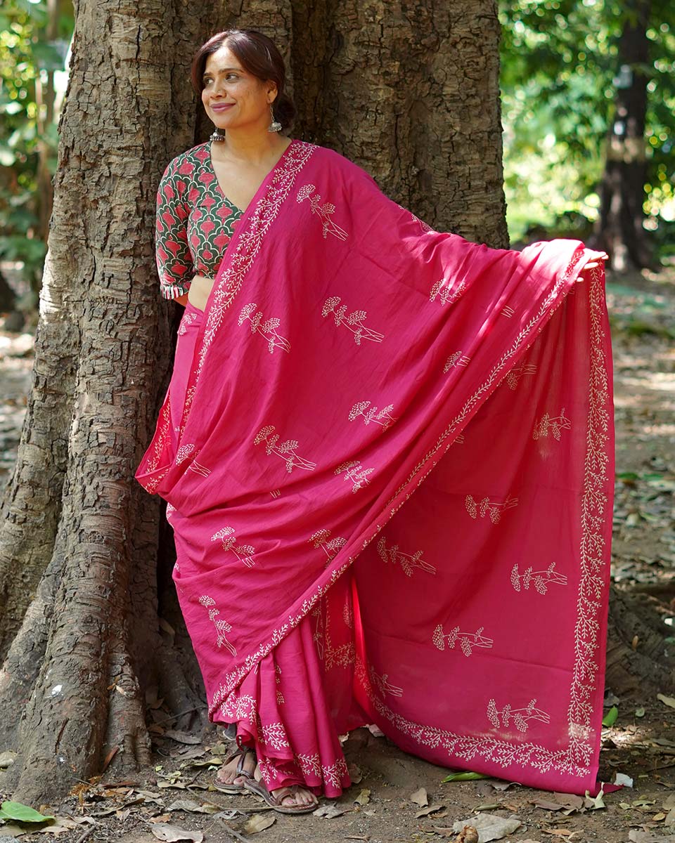 Lying on grass Pink Hand Block Printed Cotton Saree - UMT